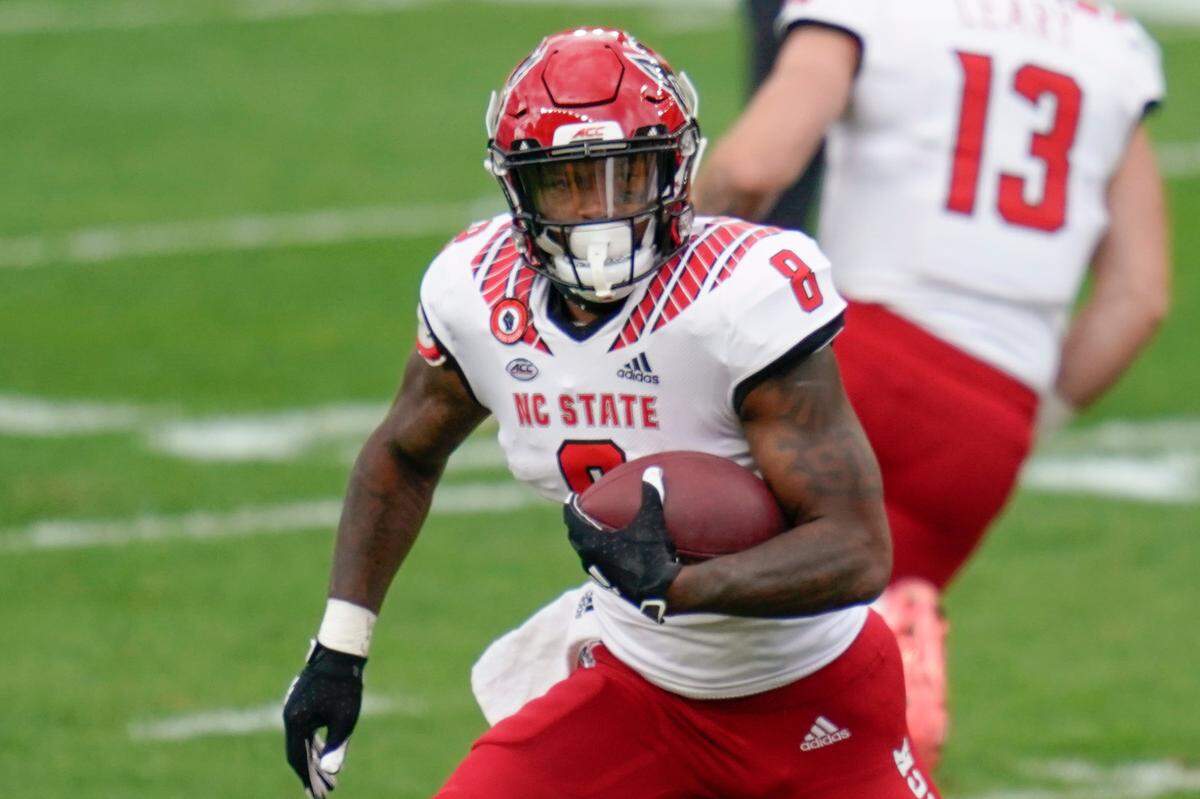 North Carolina State running back Ricky Person Jr. (8) plays against Pittsburgh during an NCAA college football game, Saturday, Oct. 3, 2020, in Pittsburgh.