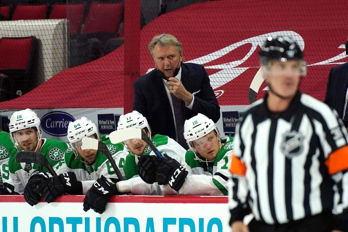 Dallas Stars coach Rick Bowness reacts during the second period of the team’s NHL hockey game against the Carolina Hurricanes in Raleigh, N.C., Sunday, April 4, 2021. (AP Photo/Gerry Broome)