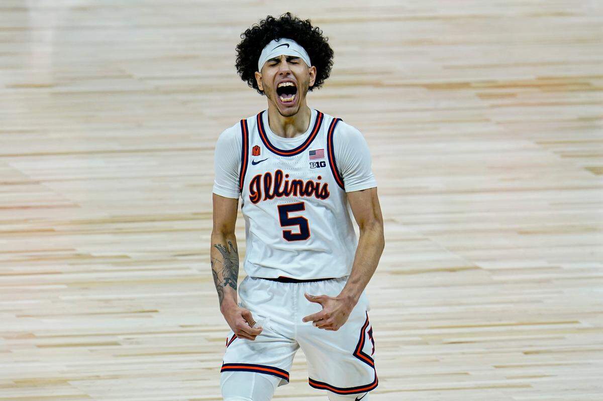 Illinois guard Andre Curbelo (5) celebrates after defeating Ohio State 91-88 in overtime at the Big Ten Conference tournament, Sunday, March 14, 2021, in Indianapolis.