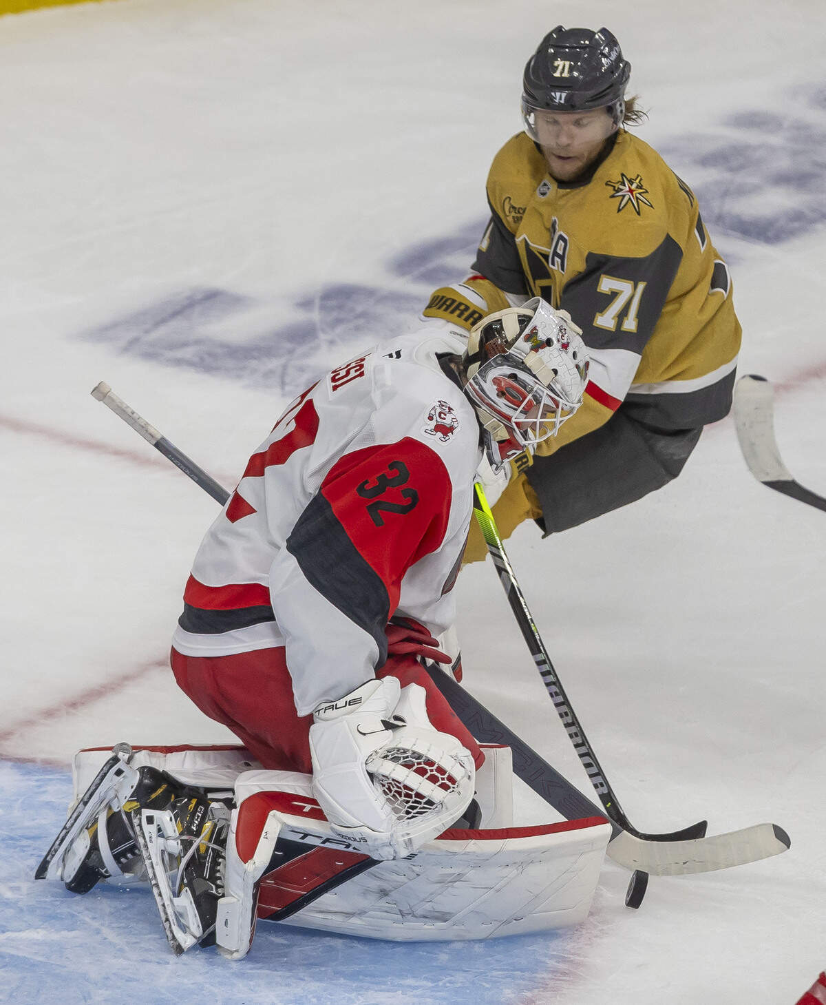 Carolina Hurricanes goalie Brandon Bussi (32) stops a scoring attempt by Vegas center William Karlsson (71) in the first overtime period in Game 3 of the Stanley Cup Final, on Saturday, June 6, 2026 at T-Mobile Arena in Las Vegas, NV.