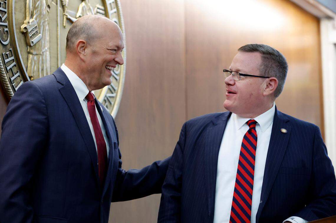 Republican N.C. Rep. Dean Arp, left, talks with then-House Speaker Tim Moore, right, after the opening session of the N.C. House of Representatives Wednesday, Jan. 11, 2023.