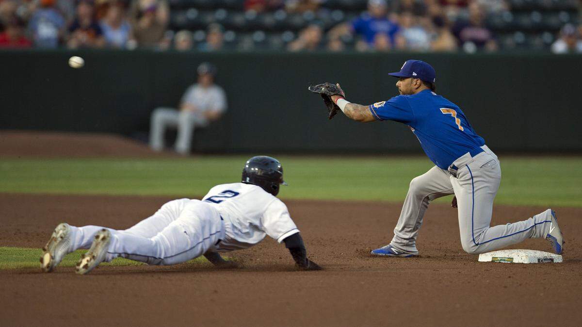 Columbus Clippers Daniel Johnson is out at second as Durham Bulls Tyler Ladendorf makes the catch in the third inning at Huntington Park on September 11, 2019.