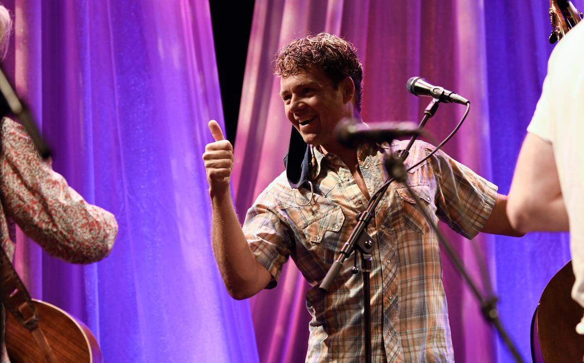 Travis Book, double bass player for The Infamous Stringdusters, gives a thumbs-up to Jim Lauderdale after a soundcheck before the 32nd Annual IBMA Bluegrass Music Awards at Raleigh, NCÕs Duke Energy Center for the Performing Arts on Sept 30.