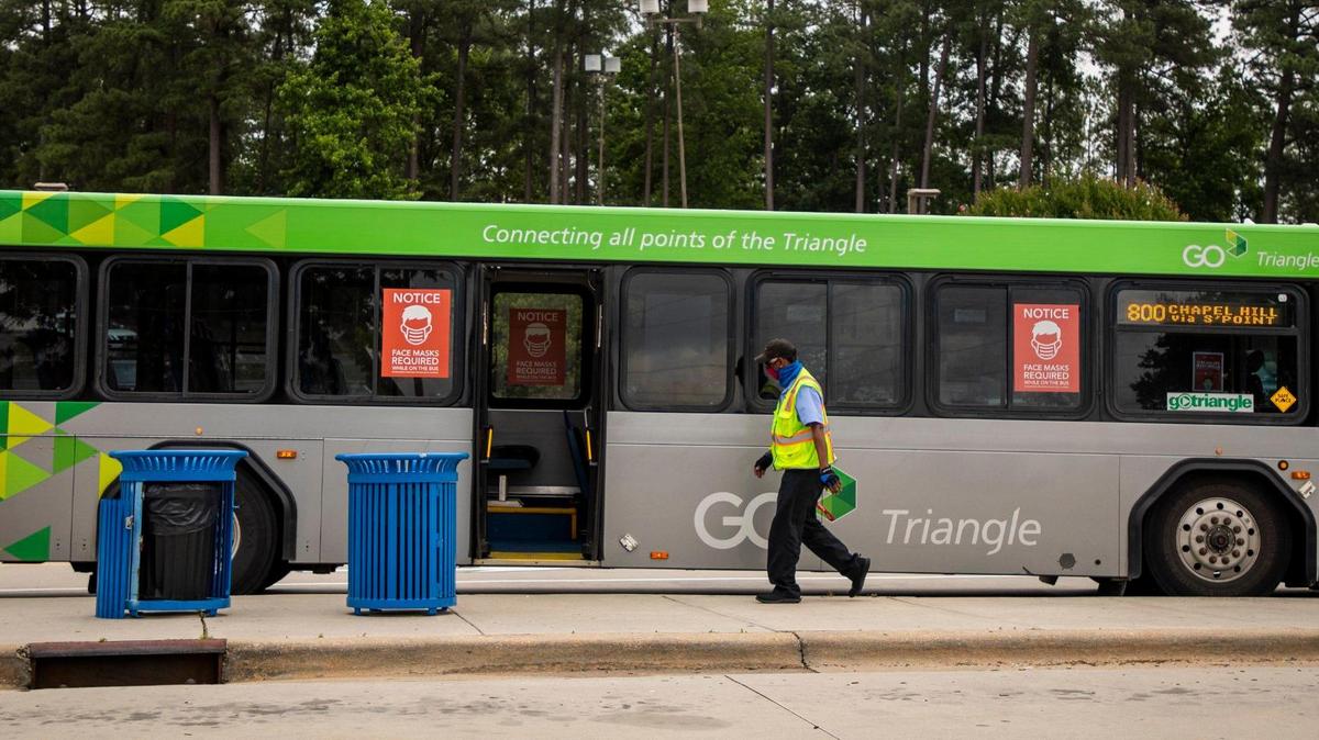 A GoTriangle bus driver takes a short break at the GoTriangle Regional Transit Center in Durham in June 2021.