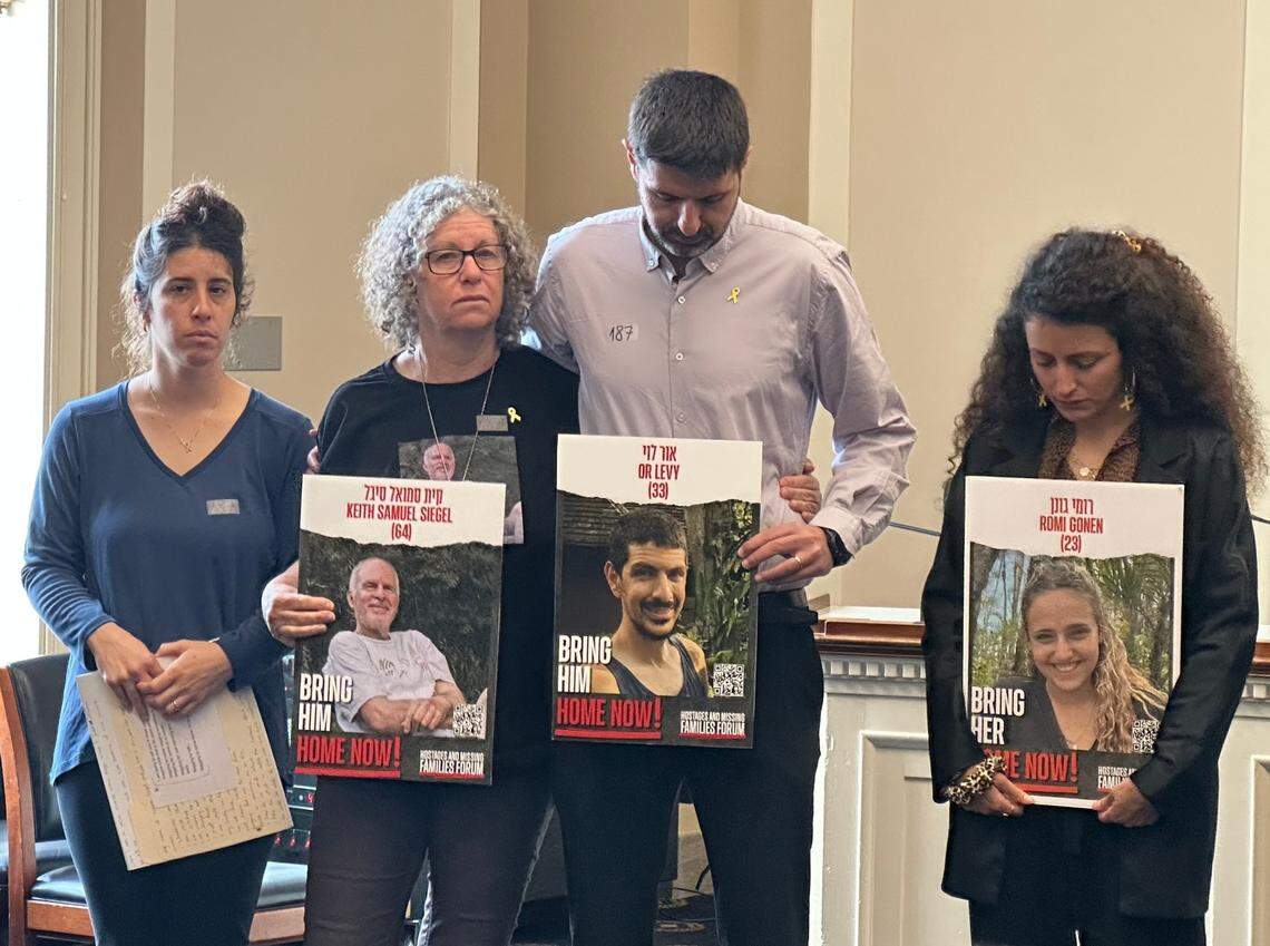 From left, Shir Siegel, Aviva Siegel, Michael Levy and Yarden Gonen stand together at the U.S. Capitol during a news conference where they called on U.S. leaders to help bring their family members home who are being held by Hamas in Gaza.