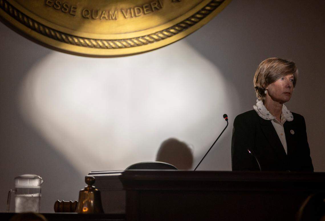 As debate of the budget moves into the evening hours, the setting sun illuminates North Carolina Lt. Governor Rachel Hunt as she presides over the Senate session on Wednesday, April 16, 2025 at the General Assembly in Raleigh, N.C.