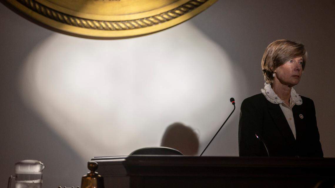 As debate of the budget moves into the evening hours, the setting sun illuminates North Carolina Lt. Governor Rachel Hunt as she presides over the Senate session on Wednesday, April 16, 2025 at the General Assembly in Raleigh, N.C.