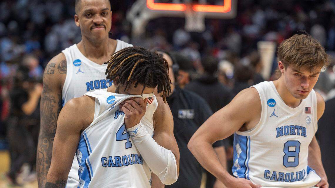 North Carolina’s R.J. Davis (4), Paxson Wojcik (8) and Armando Bacot (5) leave the court following their 89-87 loss to Alabama in the NCAA Sweet 16 on Thursday, March 28, 2024 at Crypto.com Arena in Los Angeles, CA.