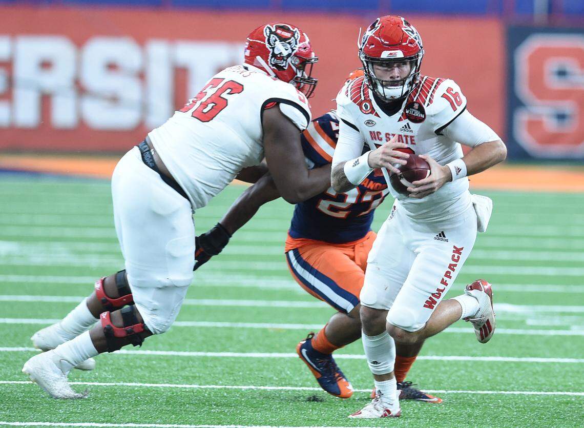 North Carolina State Wolfpack quarterback Bailey Hockman (16) runs for yards during a game against Syracuse in the second half on Saturday, Nov. 28, 2020, at the Carrier Dome in Syracuse, N.Y.