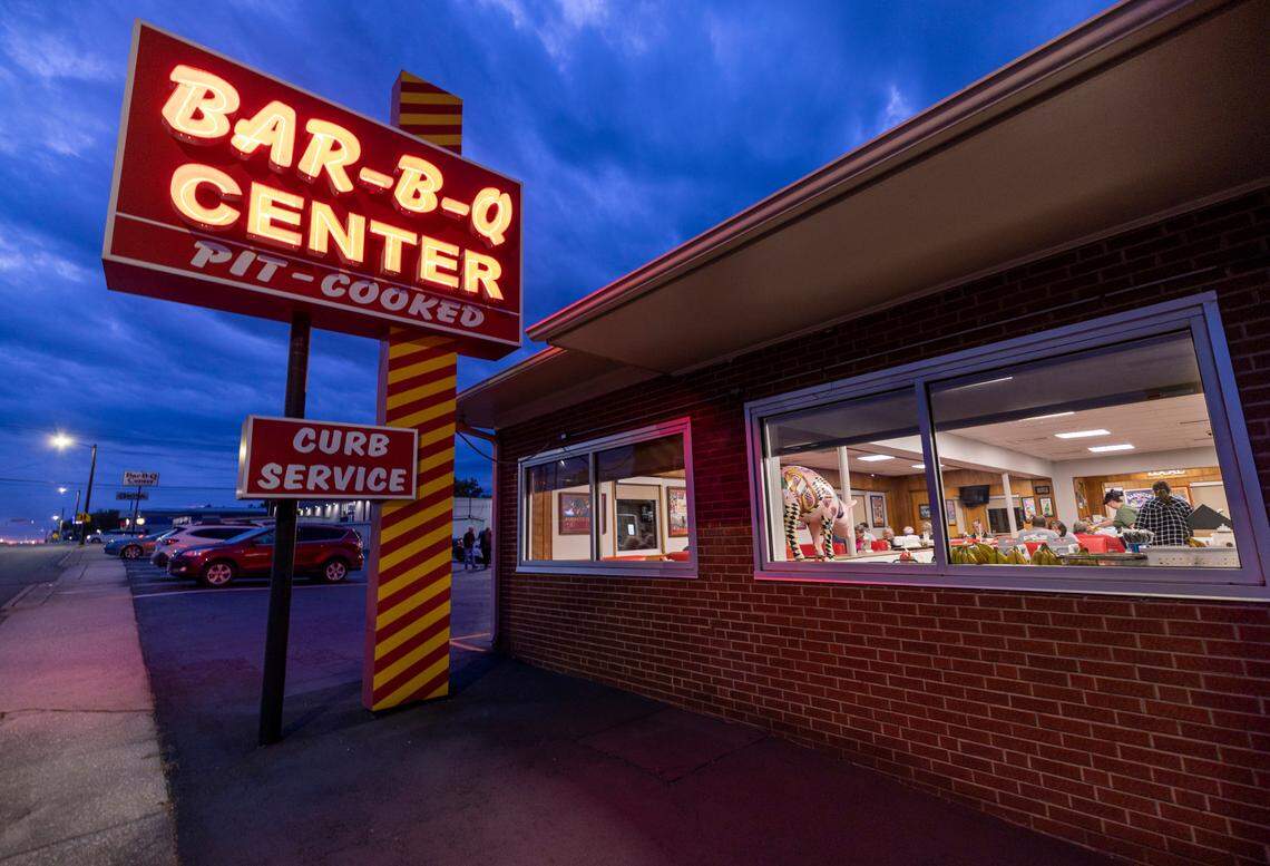 A neon sign is a beacon for customers of the Bar-B-Q Center restaurant, located on N. Main Street in Lexington, N.C.