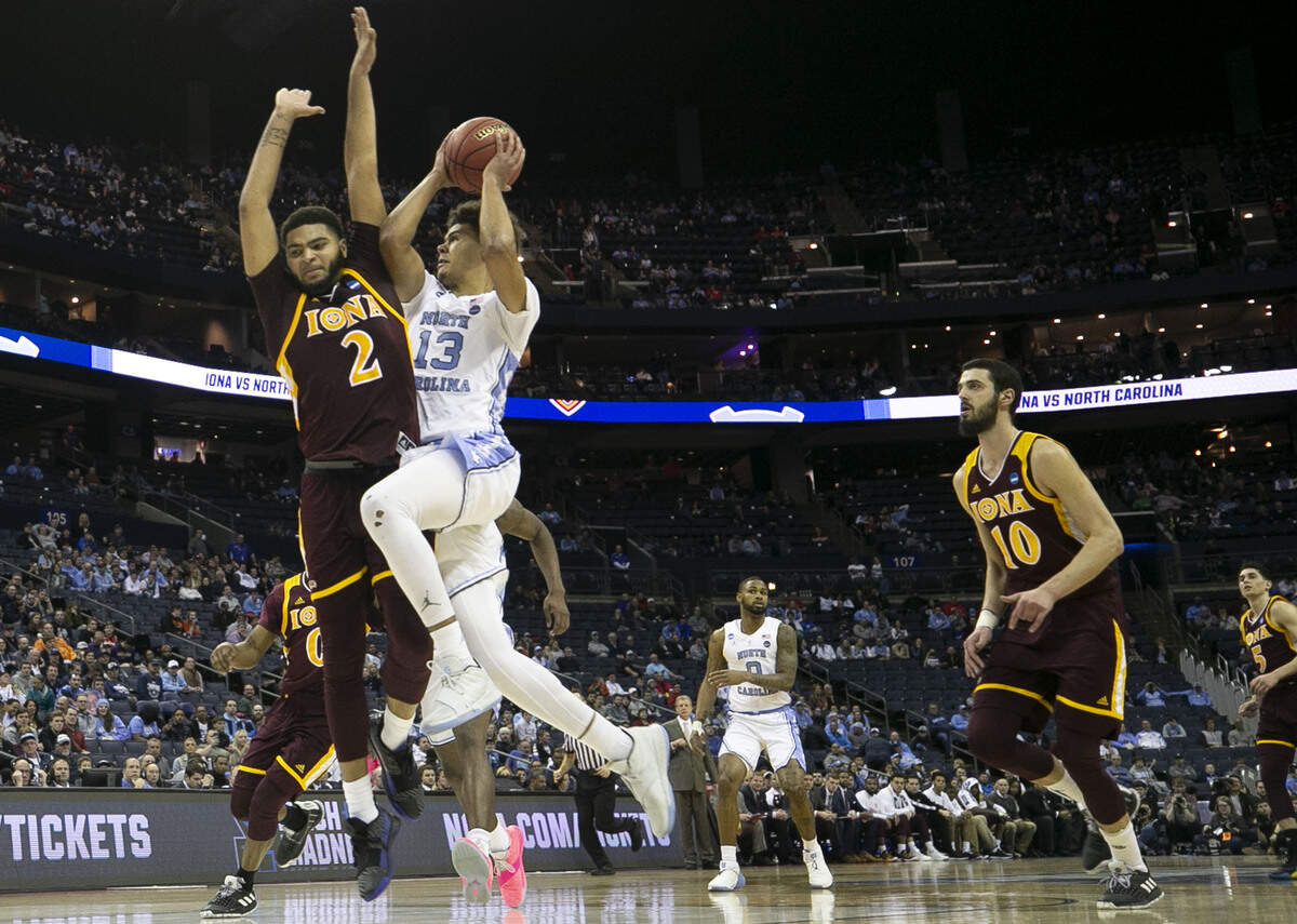 North Carolina’s Cameron Johnson (13) drives to the basket against Iona’s E.J. Crawford (2) during the second half on Friday, March 22, 2019 at Nationwide Arena in Columbus, Ohio. Johnson lead North Carolina with 21 points in their 88-73 victory over Iona.