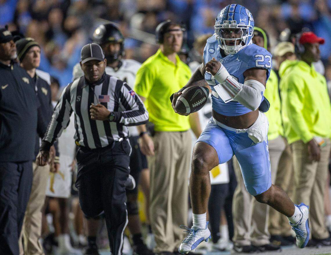 North Carolina linebacker Power Echols (23) returns an interception of Wake Forest quarterback Michael Kern 42-yards for a touchdown in the third quarter on Saturday, November 16, 2024 at Kenan Stadium in Chapel Hill, N.C.