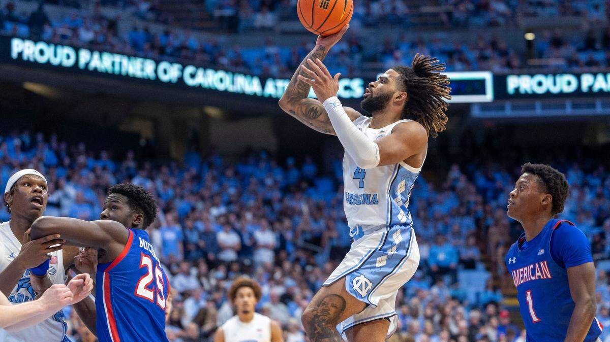 North Carolina guard R.J. Davis (4) puts up a shot over American University’s Eric Michaels (25) in the second half on Friday, November 15, 2024 at the Smith Center in Chapel Hill, N.C.