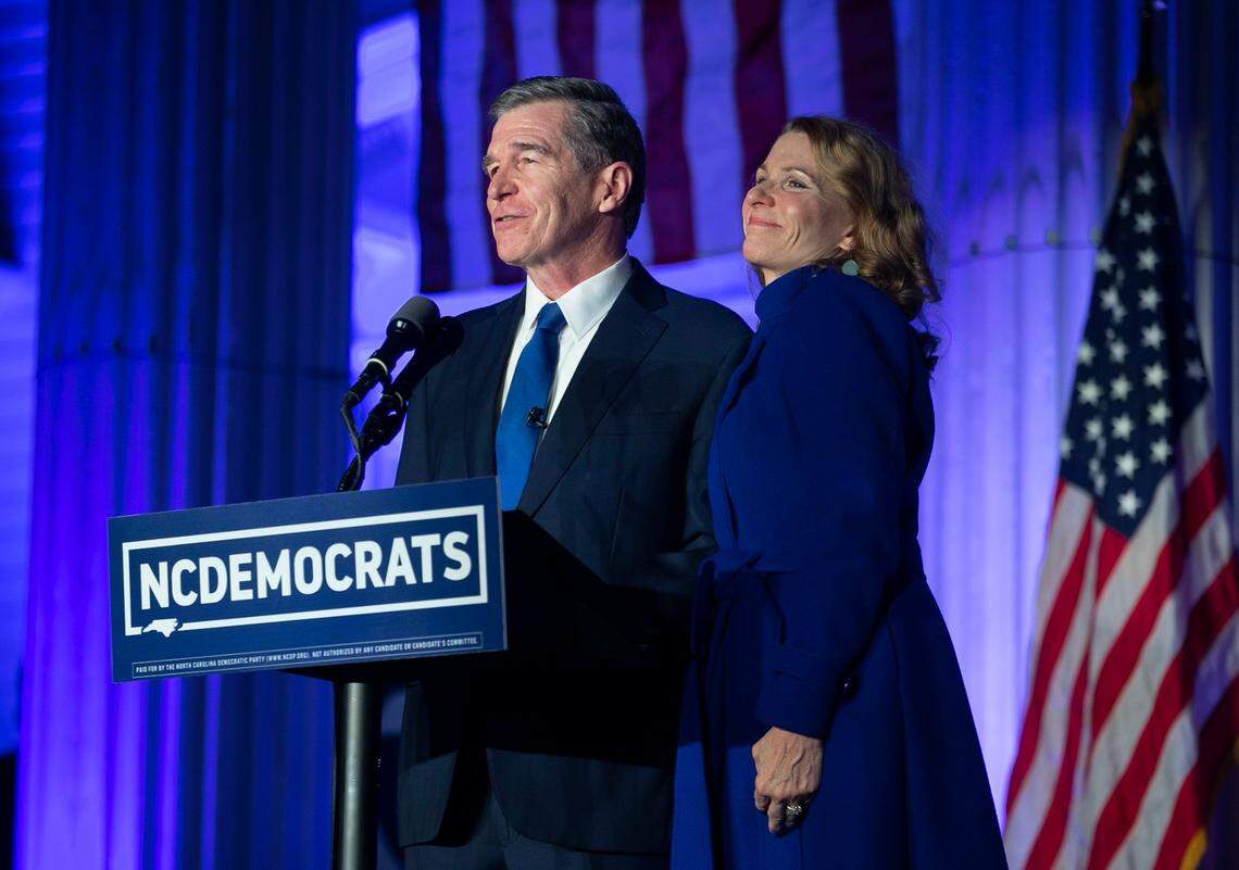 North Carolina Governor Roy Cooper thanks his wife Kristin Cooper as he declares victory at the North Carolina Democratic Party Headquarters on Tuesday, November 3, 2020 in Raleigh, N.C.
