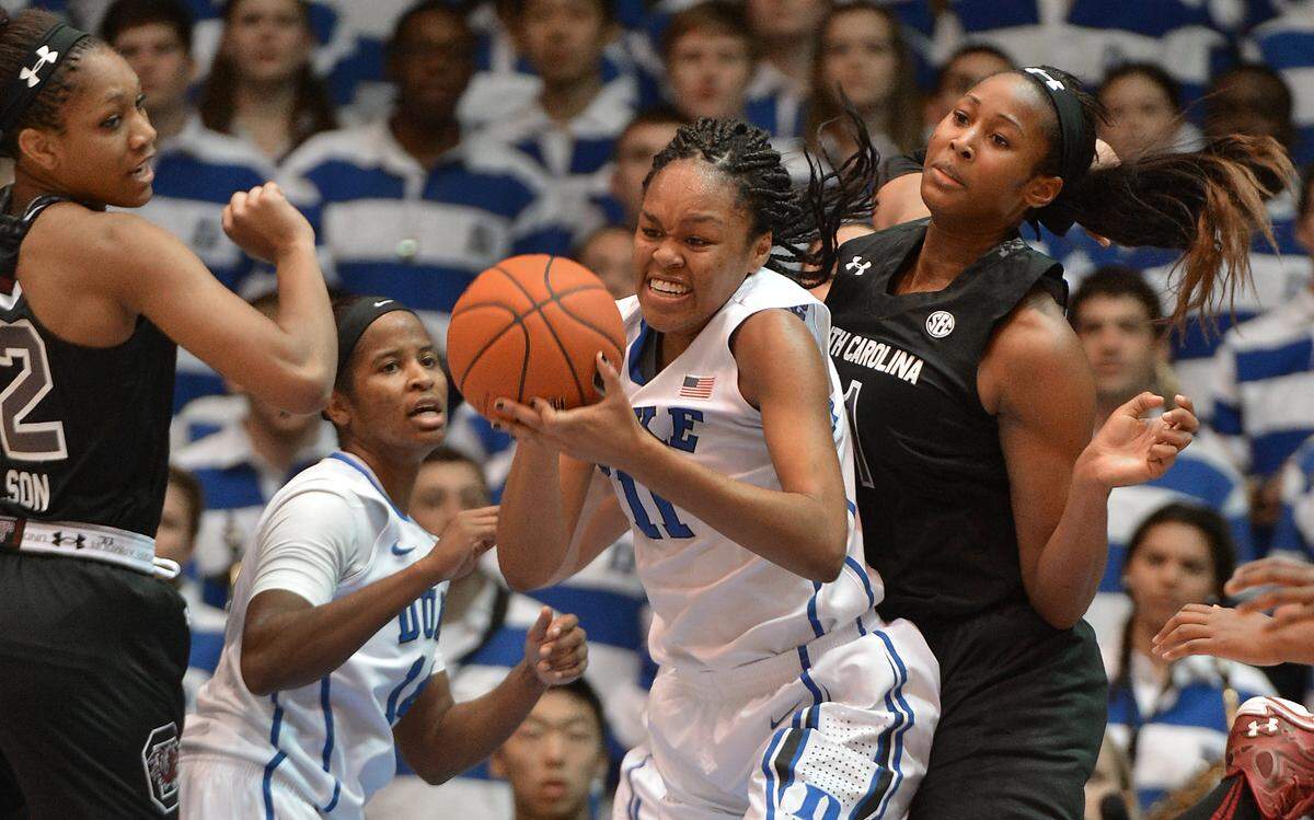 Duke forward Azura Stevens grabs a rebound from South Carolina center Alaina Coates during the Gamecocks' win over the Blue Devils on Dec. 7, 2014.