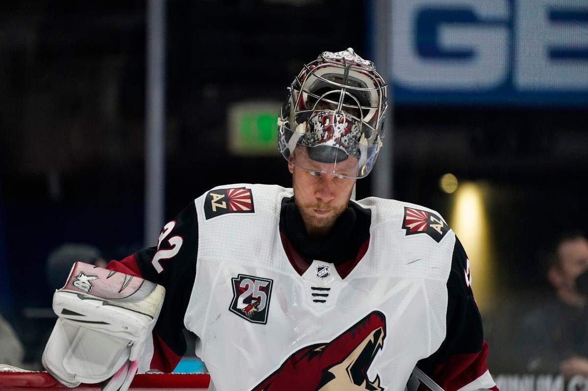 Arizona Coyotes goaltender Antti Raanta (32) n the first period of an NHL hockey game Wednesday, March 10, 2021, in Denver. (AP Photo/David Zalubowski)