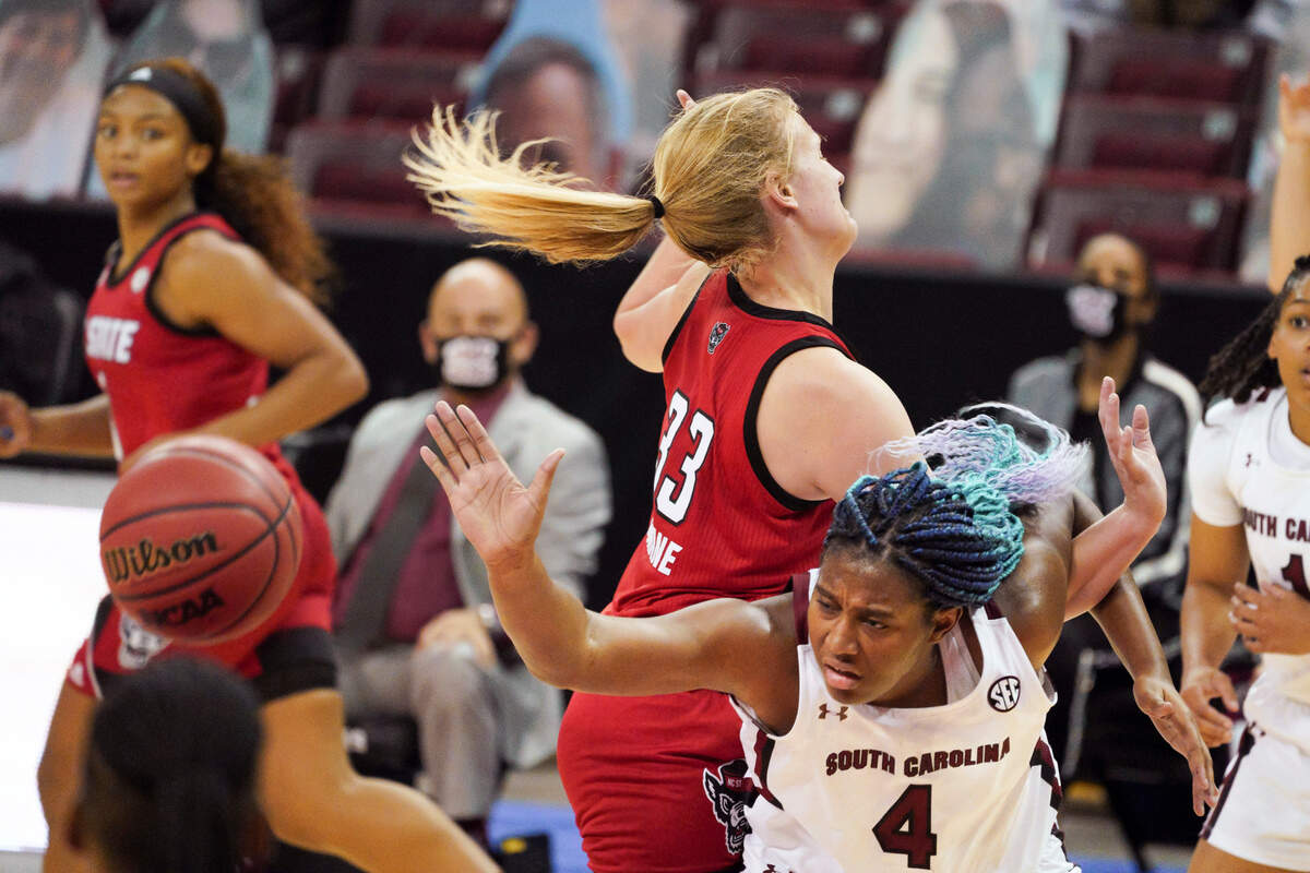 South Carolina forward Aliyah Boston (4) and North Carolina State center Elissa Cunane (33) vie for a rebound during the first half of an NCAA college basketball game Thursday, Dec. 3, 2020, in Columbia, S.C.