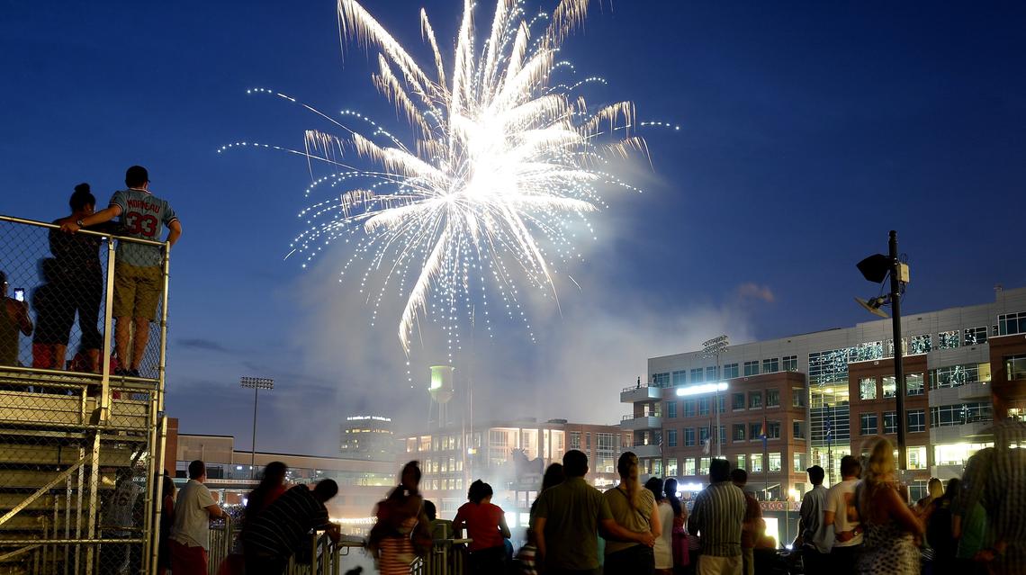 Spectators watch the fireworks display at the end of a Durham Bulls game July 4, 2016.