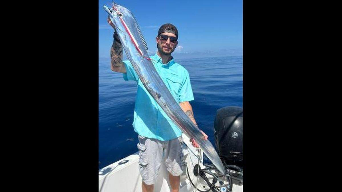 This is the record-setting Channel Scabbardfish caught by Jody Hopkins off Ocracoke, NC. It weighed 7 pounds, 3.2 ounces, measured 60 inches in length, state officials said.