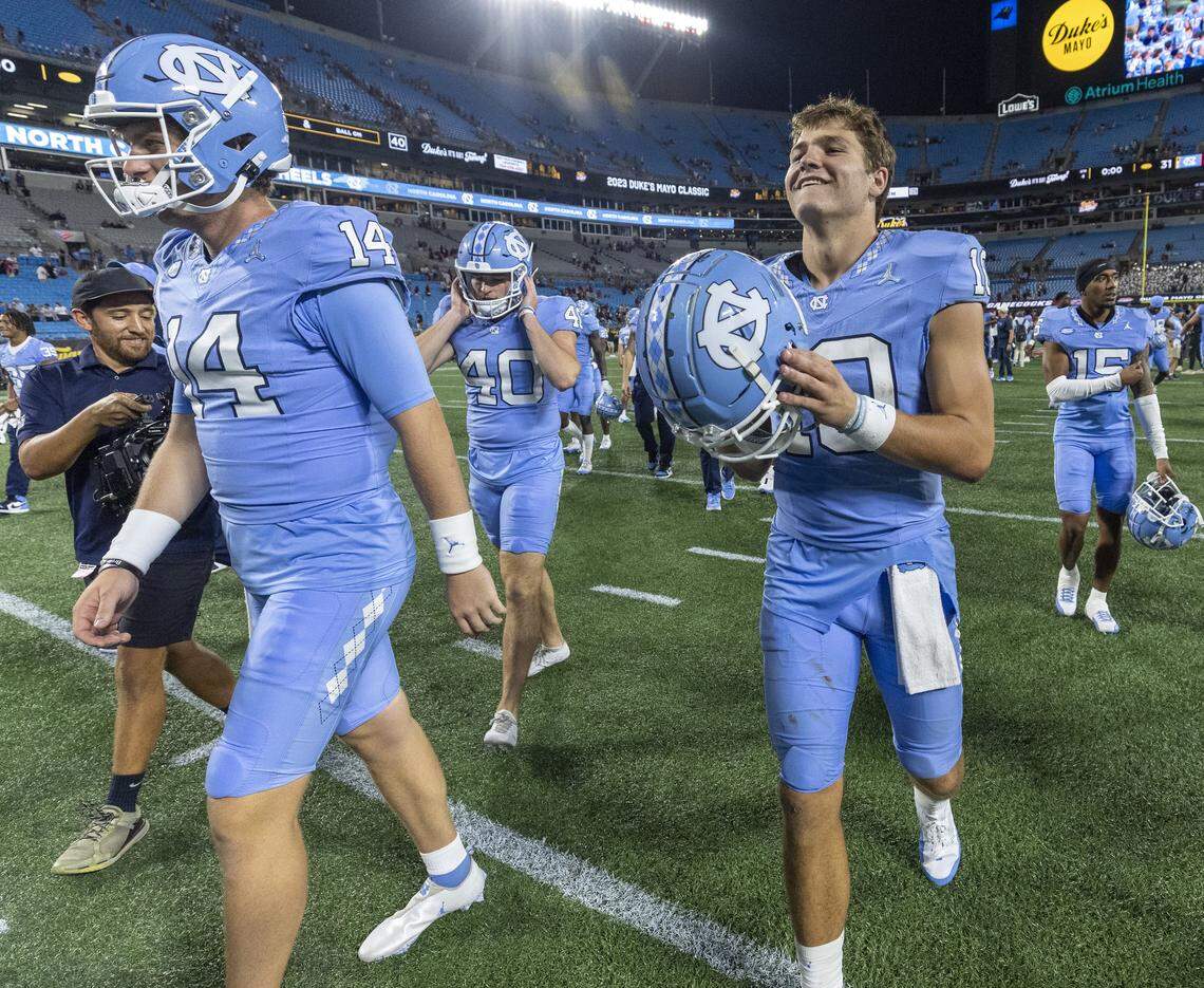 North Carolina quarterback Drake Maye (10) celebrates the Tar Heels’ 31-17 victory over South Carolina on Saturday September 2, 2023 at Bank of America Stadium in Charlotte, N.C. 
