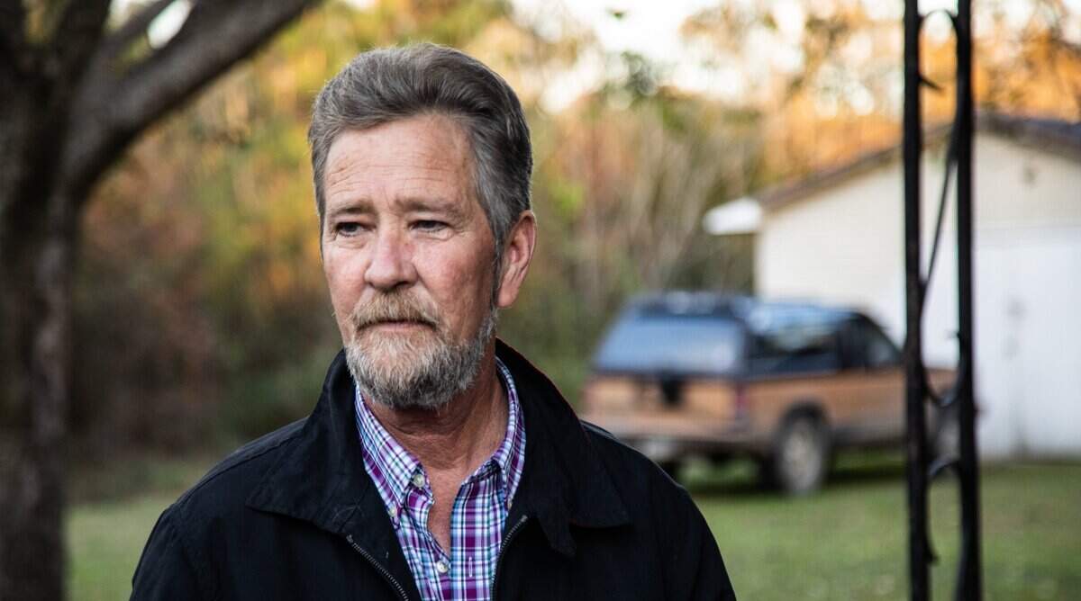 Leslie McCrae Dowless poses for a portrait outside of his home in Bladenboro, NC on Wednesday, Dec. 5, 2018.