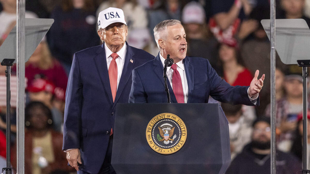 U.S. Senate candidate Michael Whatley speaks as President Donald Trump looks on during a rally for Republican candidates at Pitt-Greenville Airport in Greenville on Tuesday afternoon, Oct. 20, 2026. U.S. Senate candidate Michael Whatley speaks as President Donald Trump looks on during a rally for Republican candidates at Pitt-Greenville Airport in Greenville on Tuesday afternoon, Oct. 20, 2026.