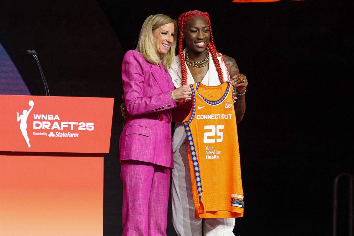 Saniya Rivers poses with WNBA commissioner Cathy Engelbert after being selected with the number eight overall pick to the Connecticut Sun in the 2025 WNBA Draft at The Shed at Hudson Yards.