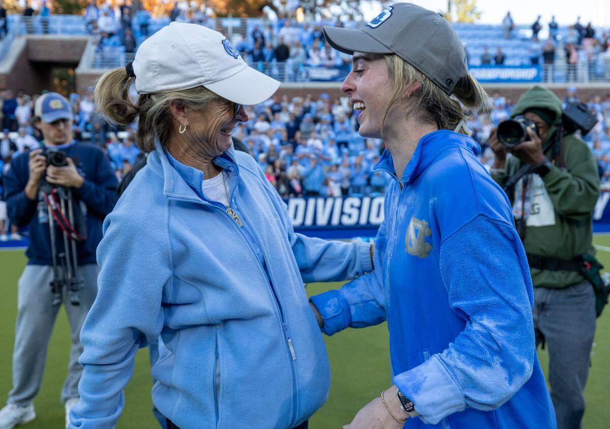 Former North Carolina field hockey coach Karen Shelton congratulates coach Erin Matson following the Tar Heels’ victory over Northwestern in the NCAA Division I Field Hockey Championship on Sunday, November 19, 2023 at Karen Shelton Stadium in Chapel Hill, N.C. Matson who won the NCAA Championship for North Carolina last season as a player, earned her first as a head coach.