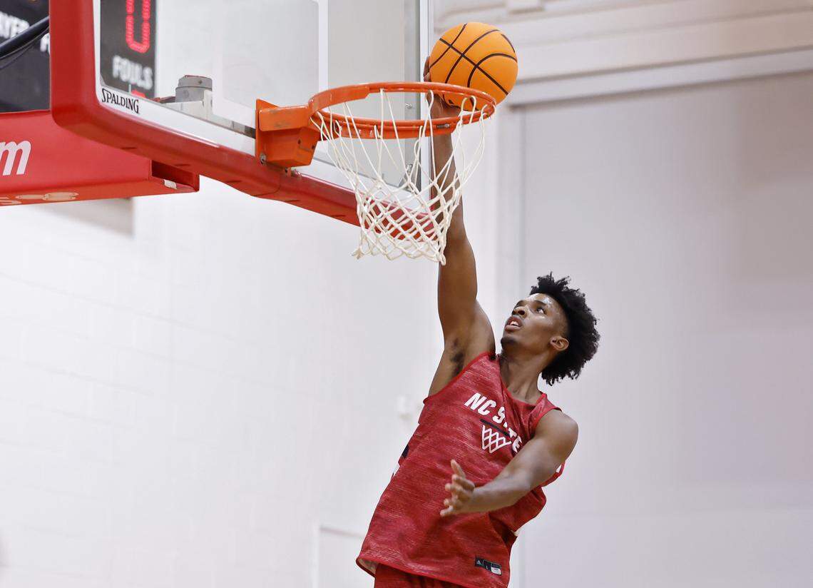 N.C. State’s Paul McNeil takes the ball to the hoop during the team’s first official practice on Monday, Sept. 22, 2025, in Raleigh, N.C. at Dail Basketball Center. 