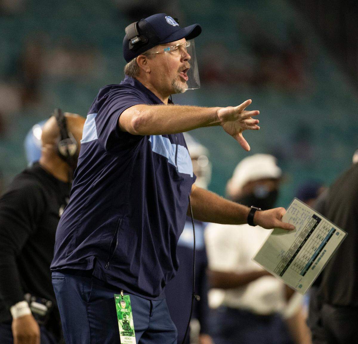 North Carolina offensive line coach Stacy Searels directs his players during the Capital One Orange Bowl on Saturday, January 2, 2021in Miami Gardens, Florida.