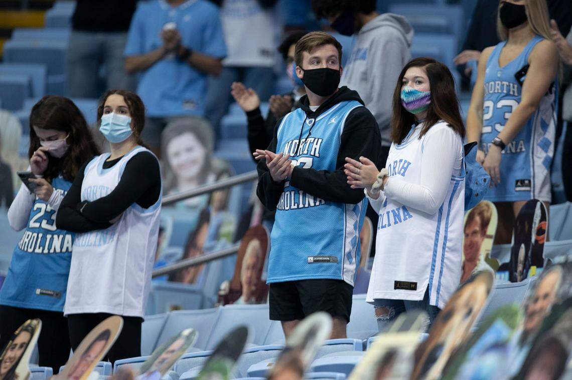 Fans stand for players introductions as North Carolina faces off against Florida State on Saturday, February 27, 2021 in Chapel Hill, N.C. Under new state CVOID-19 guidelines fans are being allowed into the game. Approximately 2400 students were given tickets.
