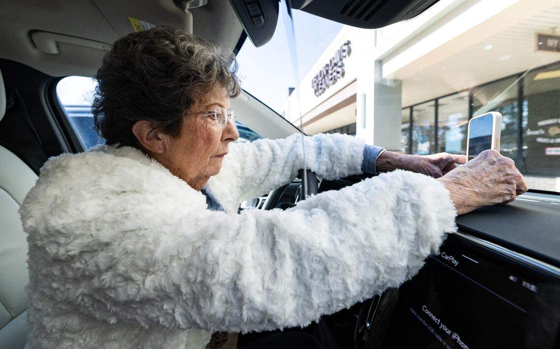 Carol Chapman, known as Grandma C, prepares to make a TikTok tasting a bagel from New York Bagel and Deli in North Raleigh, Wednesday, Jan. 15, 2025.