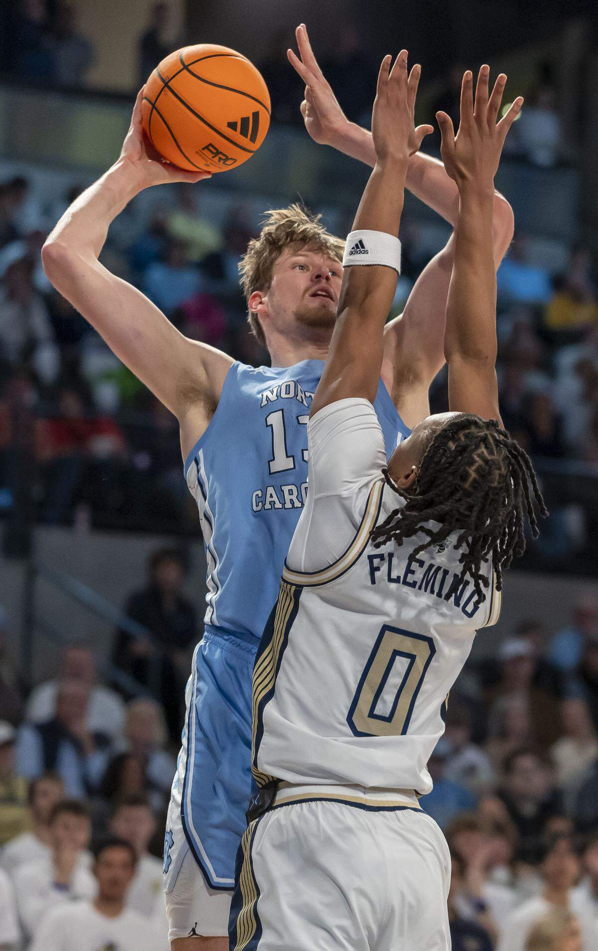 North Carolina center Henri Veesaar (13) puts up a shot against Georgia Tech forward Baye Ndongo (11) in the first half on Saturday, January 31, 2026 at McCamish Pavillon in Atlanta Ga.  