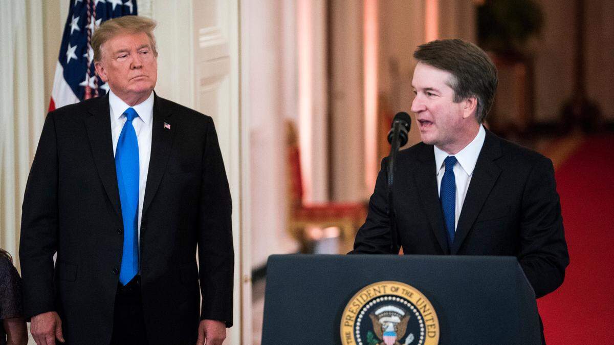 President Donald J. Trump listens to Judge Brett M. Kavanaugh during a July 9 announcement of his nomination to the Supreme Court.
