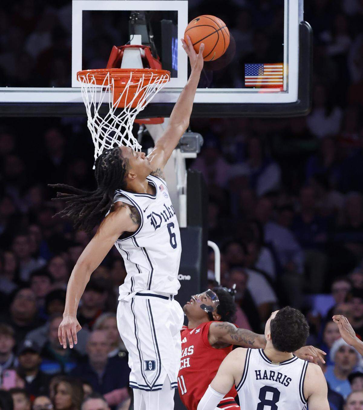 Duke’s Maliq Brown (6) blocks the shot by Texas Tech's Jaylen Petty (11) during the second half of Texas Tech’s 82-81 victory over Duke in the SentinelOne Classic at Madison Square Garden in New York City, N.Y., Saturday, Dec. 20, 2025.