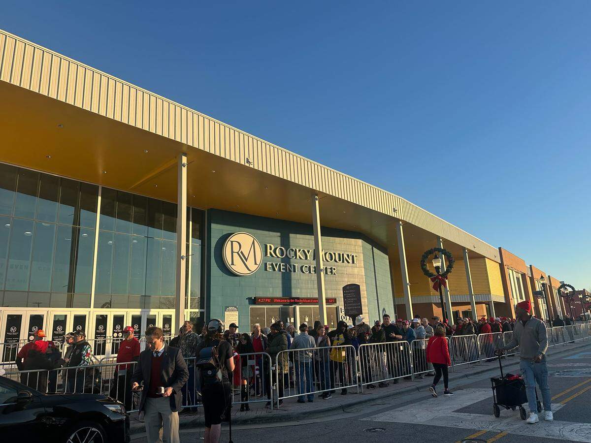 Around 100 people gathered outside the Rocky Mount Event Center at 4:30 p.m. ahead of President Donald Trump’s Friday night speech on Dec. 19, 2025, in Rocky Mount, N.C.