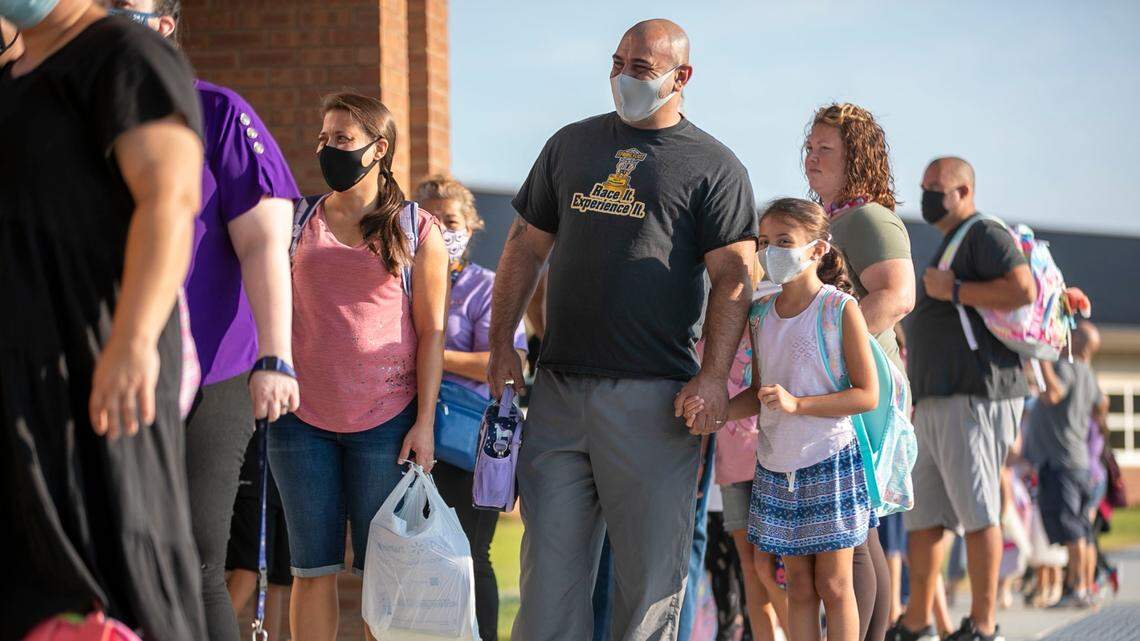 Some NC school districts temporarily stop in-person classes again due to COVID surge