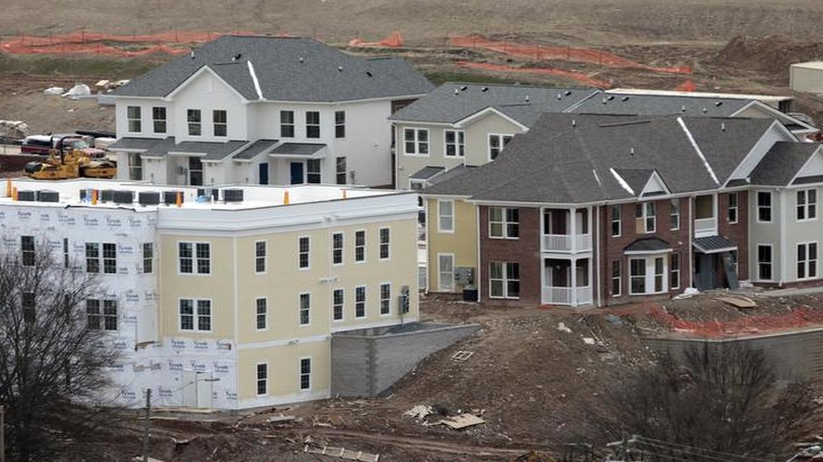 A portion of the Phase 1 apartment buildings and townhouses at the Southside development near downtown Durham take shape in this March 2014 photo. Home values in neighborhoods like Southside where redevelopment occurred rose nearly 79%.