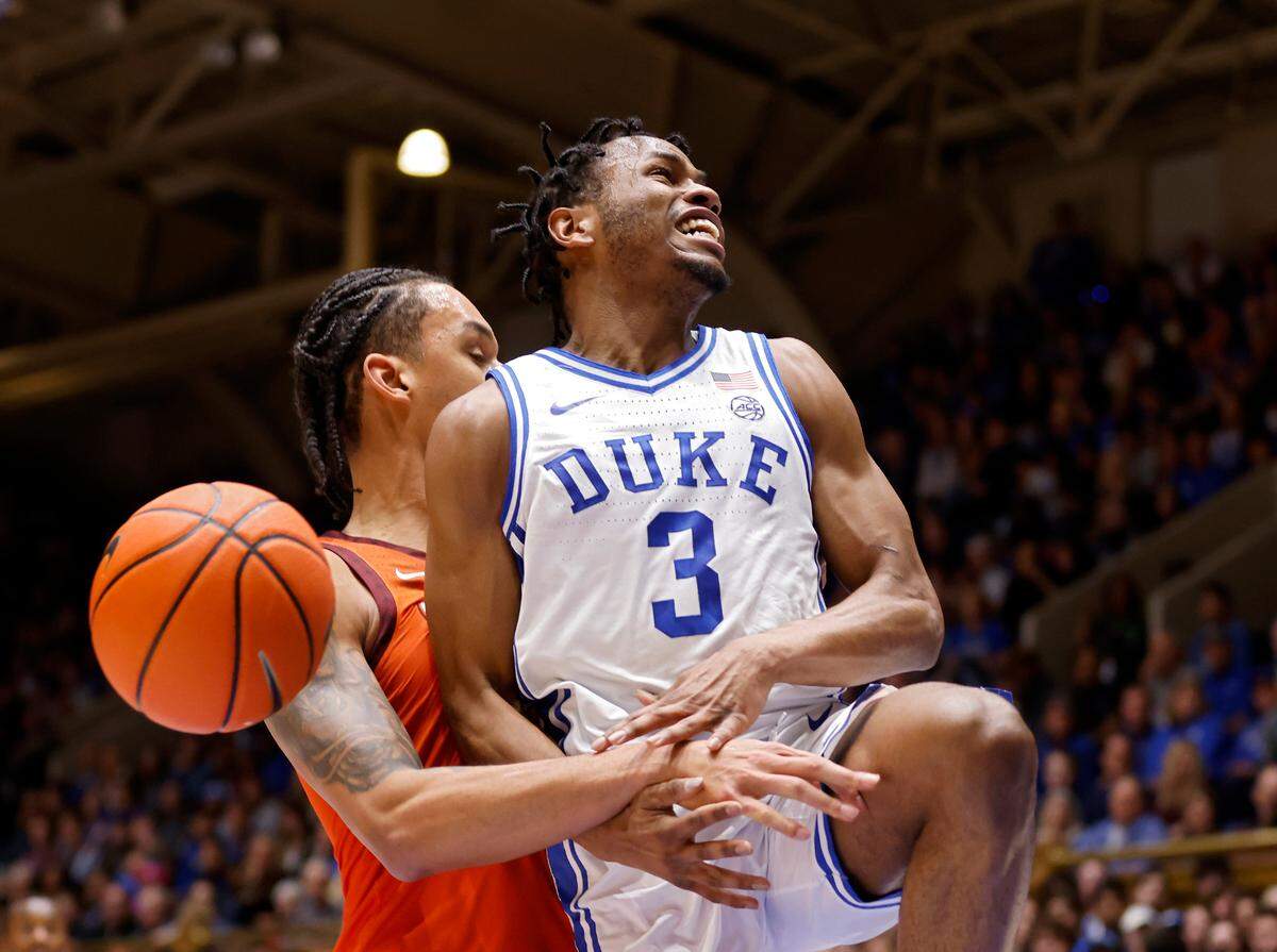 Duke’s Jeremy Roach is fouled by Virginia Tech’s Lynn Kidd during the first half of the Blue Devils’ 81-65 win over Virginia Tech on Saturday, Feb. 25, 2023, at Cameron Indoor Stadium in Durham, N.C.