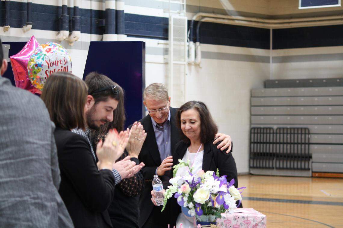 Dana King was honored at a surprise ceremony at Millbrook High School in Raleigh, N.C., on March 28, 2022. King died on April 2 just weeks before she was to retire on April 29 as the school's principal.