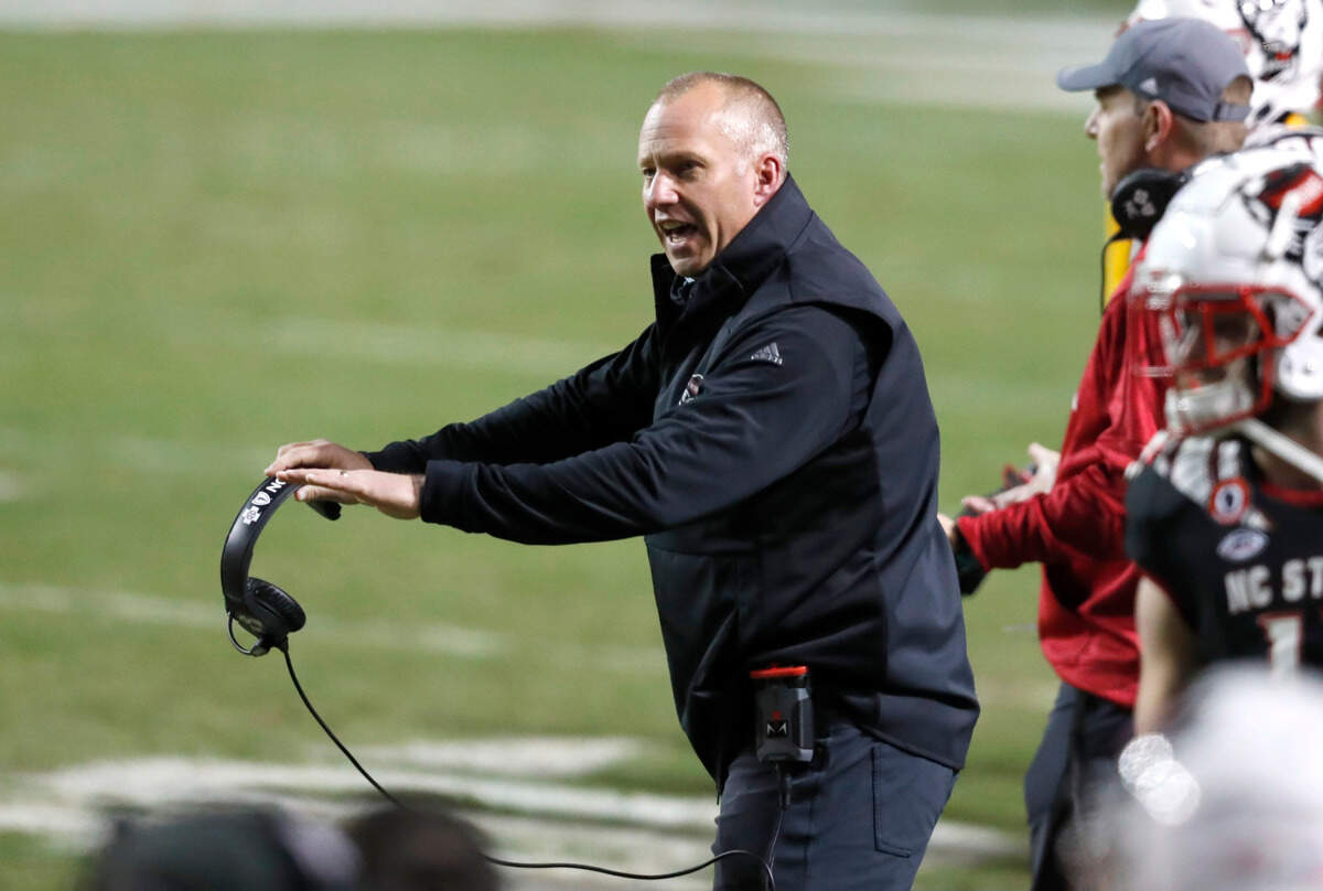 N.C. State head coach Dave Doeren yells to the officials during the second half of N.C. State’s 23-13 victory over Georgia Tech at Carter-Finley Stadium in Raleigh, N.C., Saturday, Dec. 5, 2020.