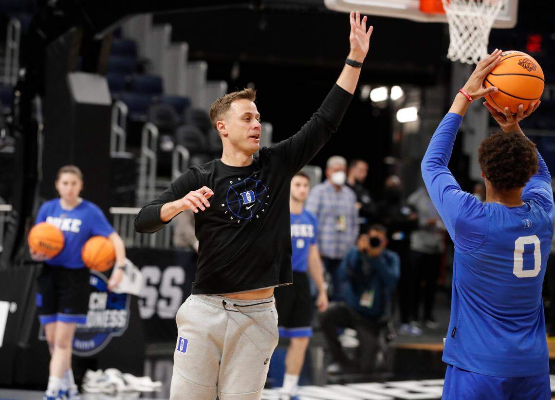 Duke associate head coach Jon Scheyer defends as Wendell Moore Jr. shoots during the Blue Devils’ practice at the Chase Center in San Francisco, Calif. Wednesday, March 23, 2022. Duke plays Texas Tech in the Sweet 16 Thursday.