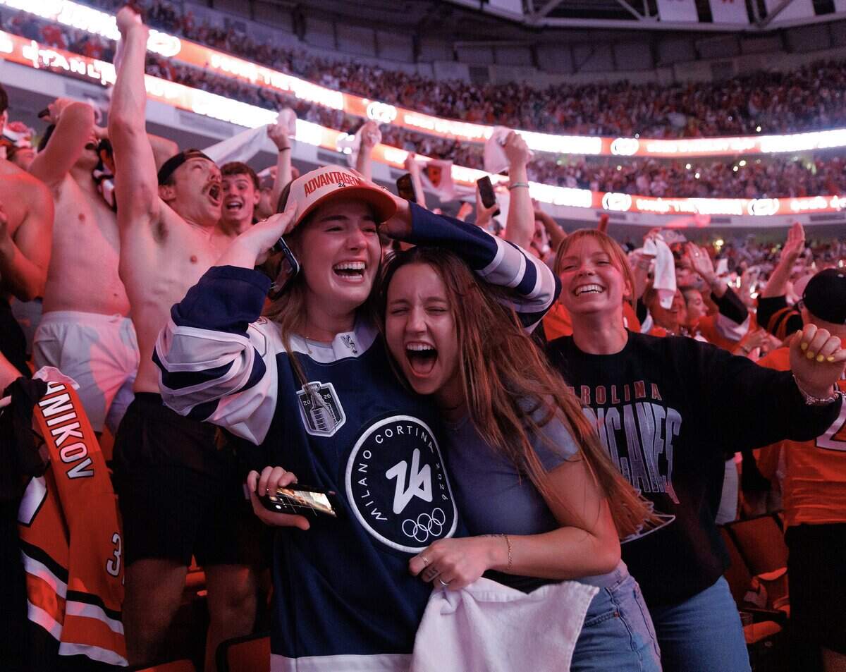 Fans celebrate the Carolina Hurricanes’ Stanley Cup victory over the Vegas Golden Knights during a game 6 watch party at the Lenovo Center on Sunday, June 14, 2026, in Raleigh, N.C.