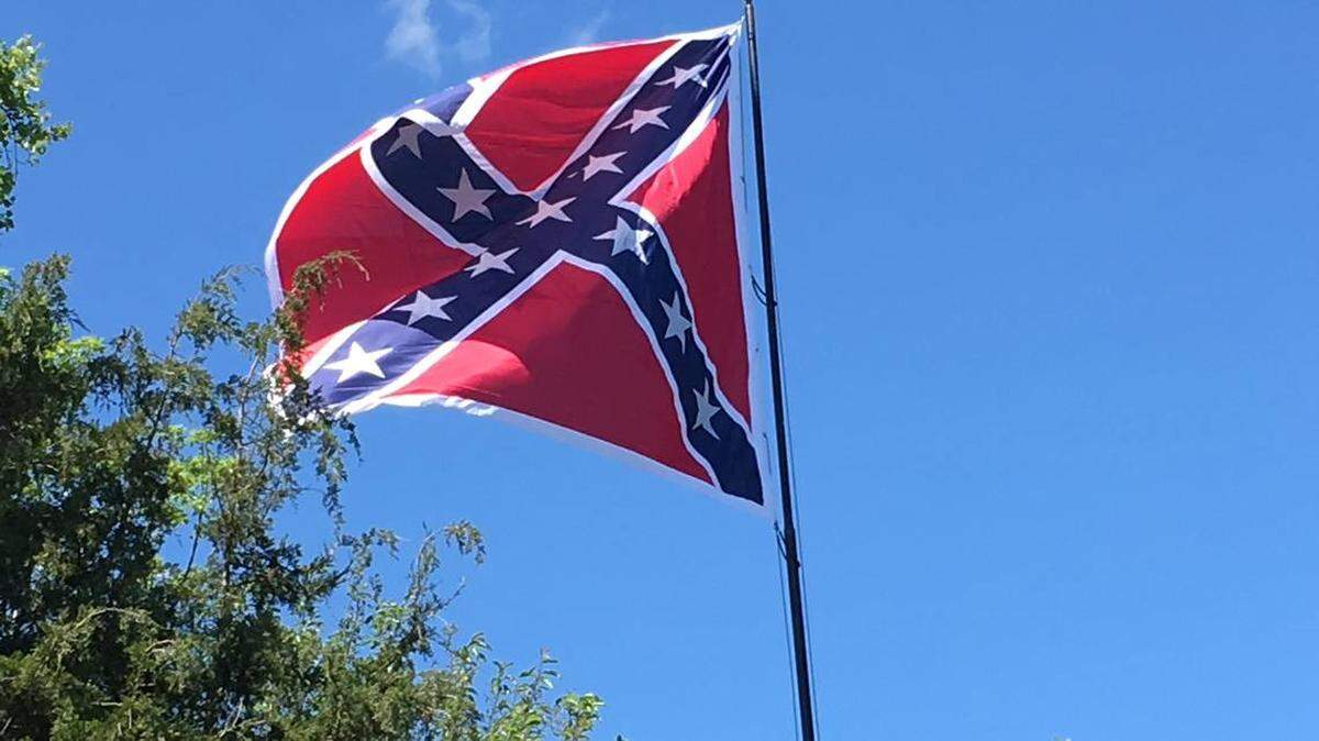 A Confederate flag flies over U.S. 70 in Orange County, North Carolina.
