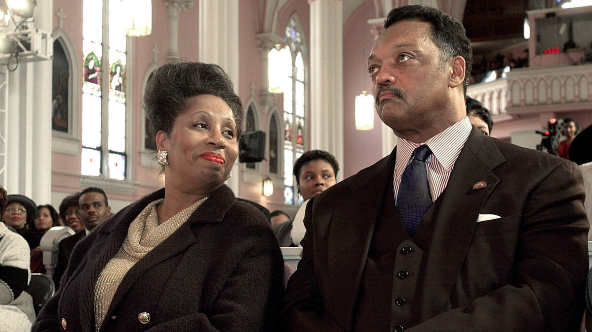 Jacqueline Jackson looks to her husband, Rev. Jesse Jackson, during services at the Salem Baptist Church of Chicago, Sunday, Jan. 21, 2001.
