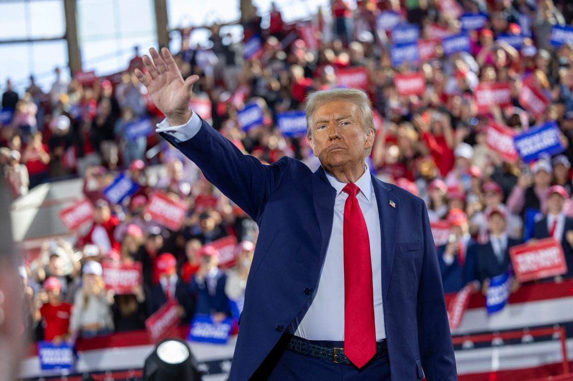 Republican presidential nominee and former President Donald Trump leaves the stage following a rally at Dorton Arena in Raleigh on Monday, Nov. 4, 2024, one day before Election Day.