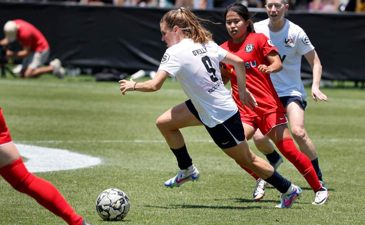 US Women’s Heather O’Reilly (9) keeps control of the ball during Streetball FC Canada’s 3-0 victory over the US Women during the TST Soccer Tournament at WakeMed Soccer Park in Cary, N.C., Friday, June 7, 2024.