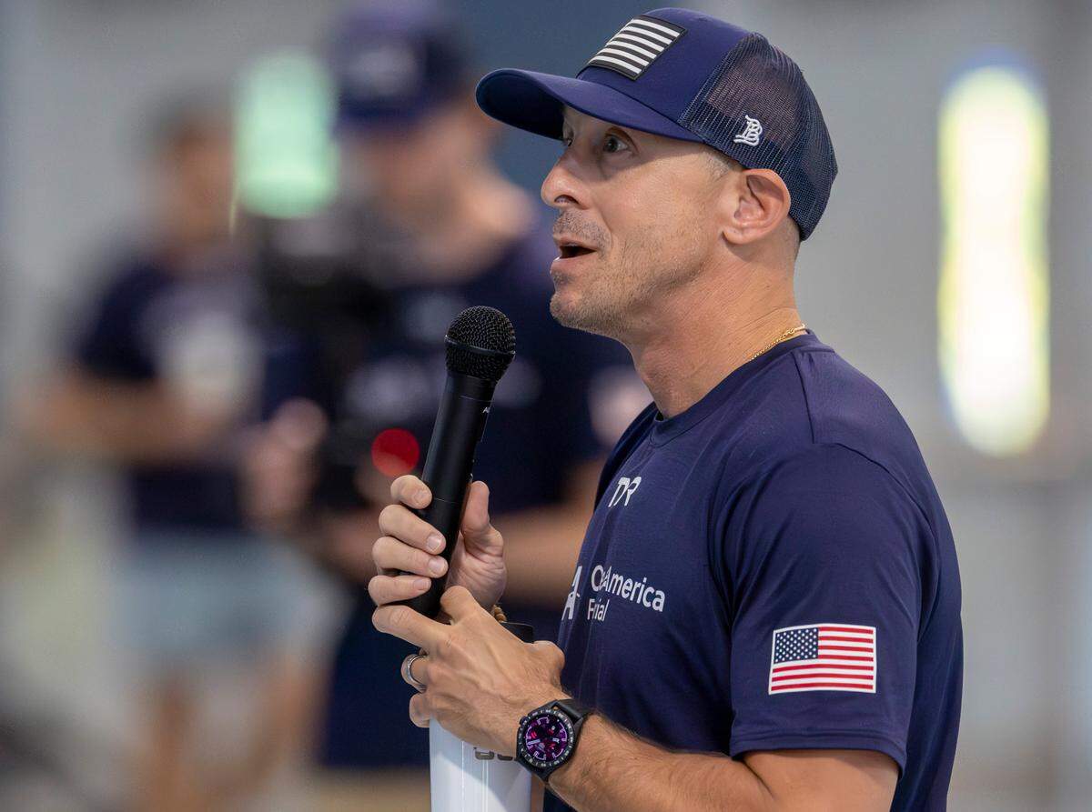 Todd DeSorbo, head coach of the 2024 U.S. Women’s Swim team addresses the crowd during the Olympic Swim Team practice on Saturday, July 6, 2024 at the Triangle Aquatic Center in Cary, N.C.