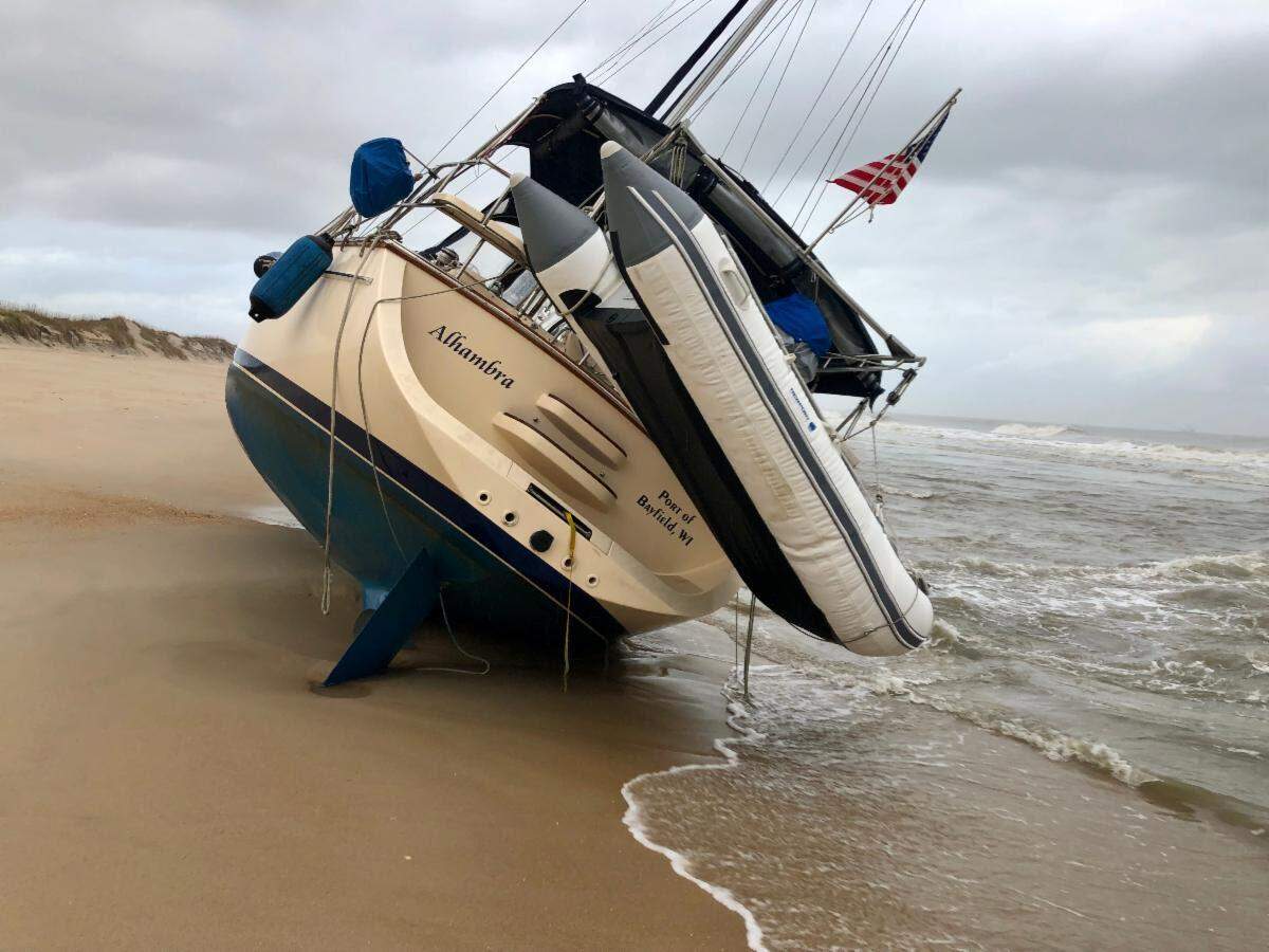 A 37-foot sailing vessel ran aground on Cape Hatteras National Seashore on North Carolina’s Outer Banks on Saturday, Dec. 11. Crews are working to remove it.