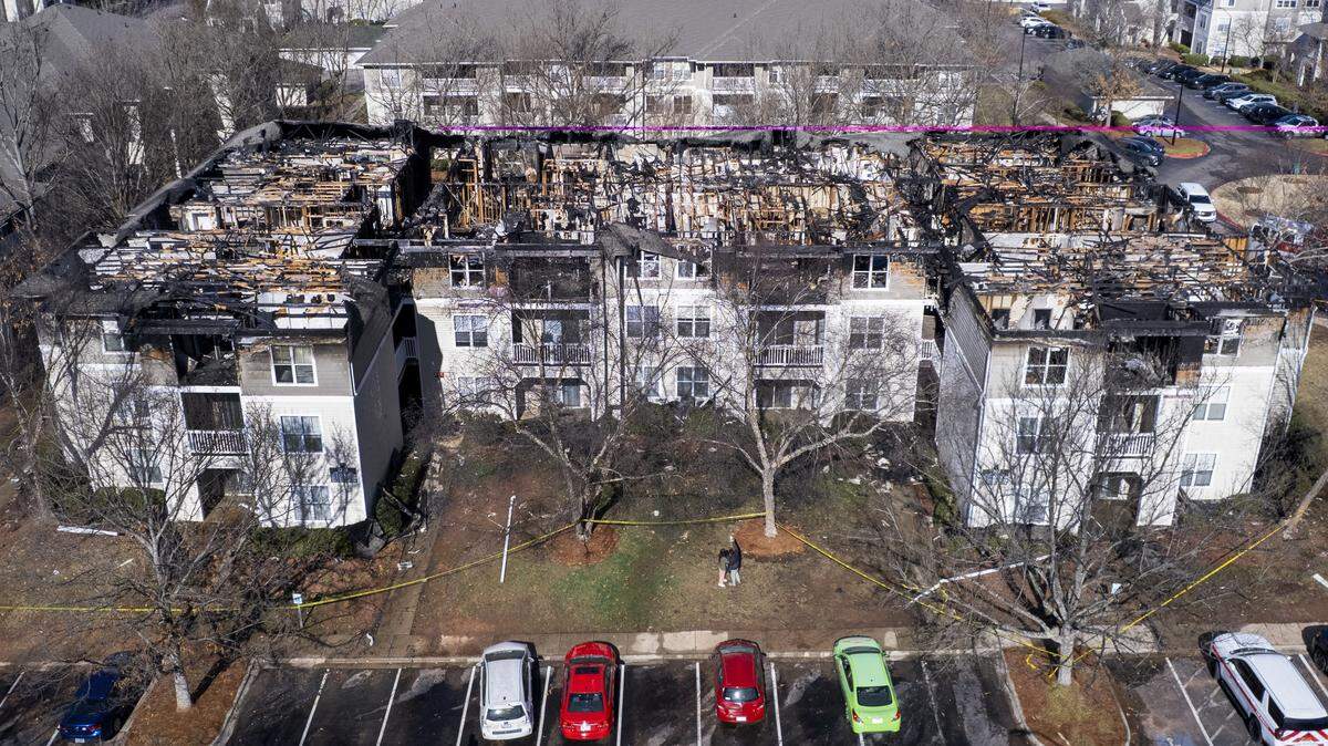 The scene at the Camden Westwood apartments at 2100 Summit Ridge Loop in Morrisville following a three-alarm fire that began Monday evening. The blaze ignited around 6 p.m. at one of the complex’s residential buildings. The fire affected 30 apartments and displaced approximately 70 residents. One person was taken to a local hospital for treatment while five others were treated at the scene for smoke inhalation.